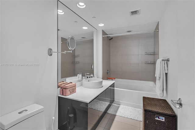 full bathroom with tile patterned flooring, toilet, bathtub / shower combination, recessed lighting, and visible vents