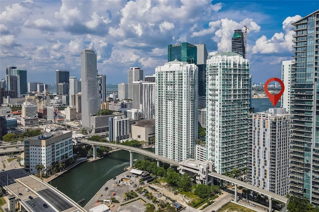 property's view of city featuring a water view