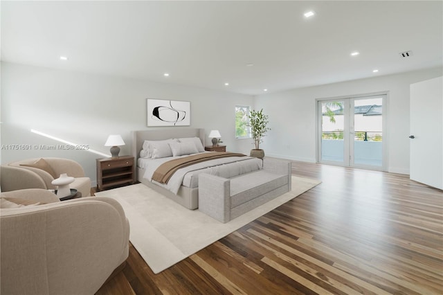 bedroom with baseboards, access to outside, wood finished floors, and recessed lighting