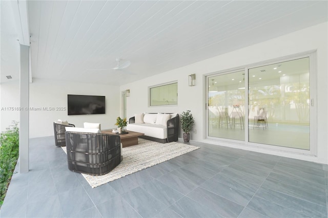 living area featuring tile patterned flooring