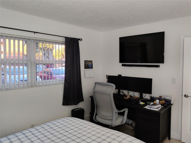 bedroom with a textured ceiling