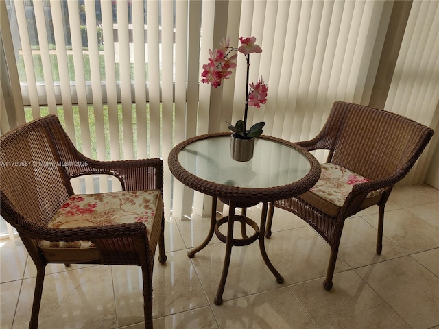 living area featuring light tile patterned flooring