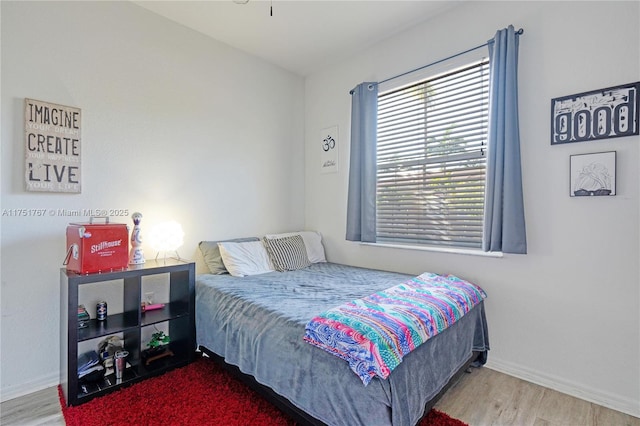 3383 Merrick Ct Unit 1116, Margate, FL 33063 - bedroom with wood finished floors and baseboards