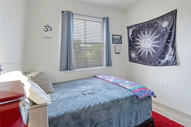 3383 Merrick Ct Unit 1116, Margate, FL 33063 - bedroom with wood finished floors and baseboards