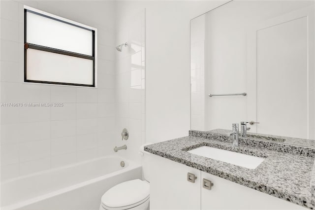 full bath with shower / bath combination, vanity, and toilet