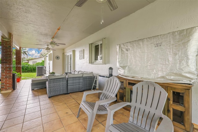 view of patio with ceiling fan and outdoor lounge area