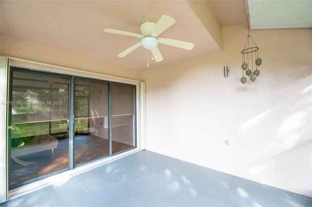 view of patio featuring ceiling fan