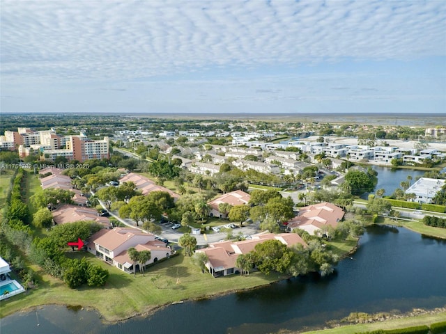 aerial view with a water view and a residential view