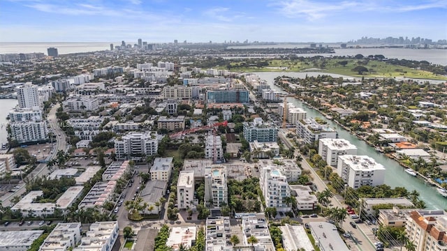 aerial view featuring a water view and a city view