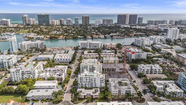 aerial view featuring a water view and a city view