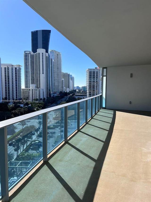 balcony featuring a city view