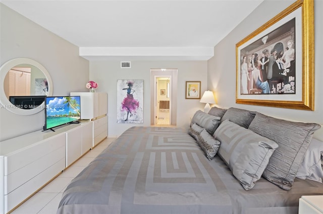 bedroom with visible vents and light tile patterned flooring