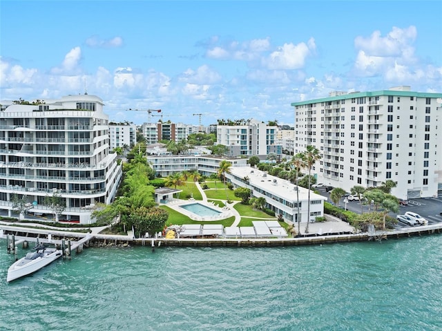 aerial view with a water view and a city view