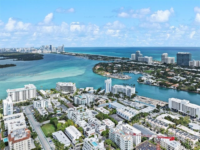 drone / aerial view with a water view and a city view