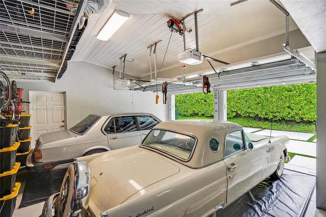 garage featuring a garage door opener