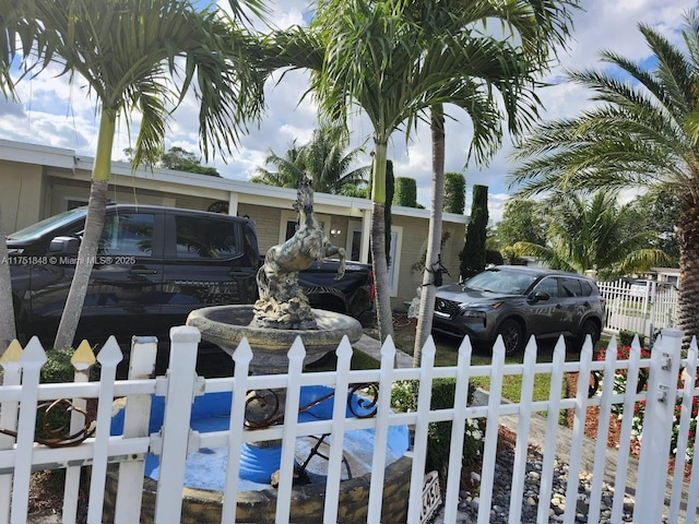 exterior space featuring a fenced front yard