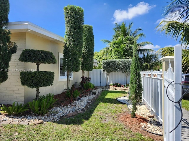 view of yard featuring fence