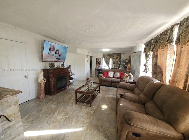 living room featuring a fireplace