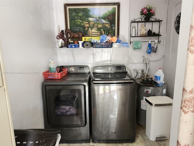 clothes washing area featuring laundry area and independent washer and dryer