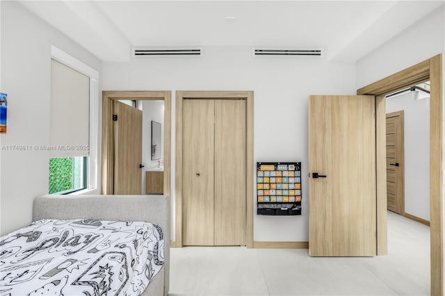 bedroom featuring visible vents and baseboards