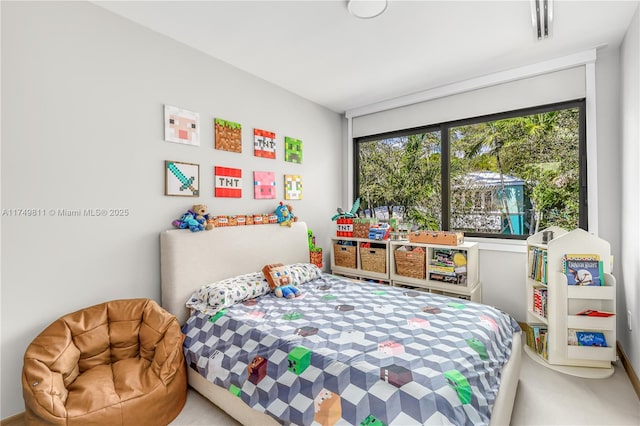 bedroom featuring visible vents