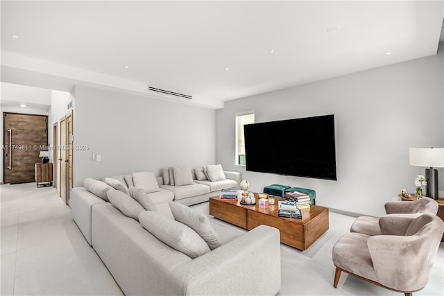 living room featuring visible vents and recessed lighting