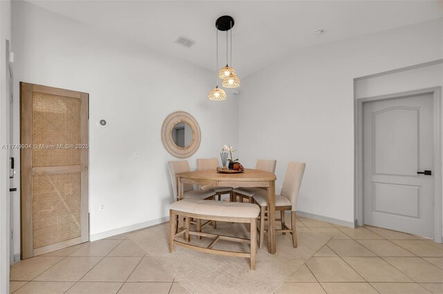 15010 SW 178th Ter, Miami, FL 33187 - dining room featuring lofted ceiling, baseboards, visible vents, and light tile patterned flooring