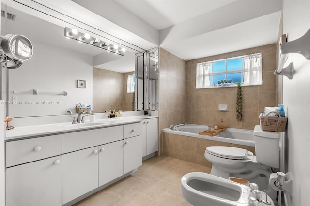 15010 SW 178th Ter, Miami, FL 33187 - bathroom with visible vents, toilet, tile patterned floors, vanity, and a bidet