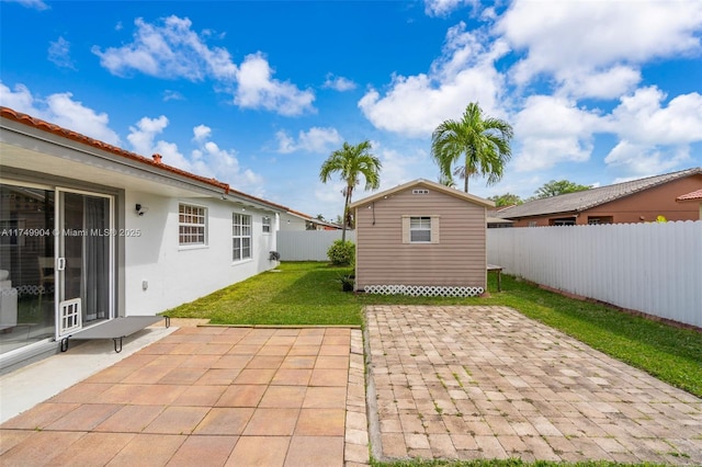 15010 SW 178th Ter, Miami, FL 33187 - view of patio featuring an outbuilding and a fenced backyard