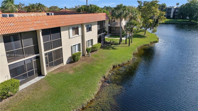 aerial view featuring a water view