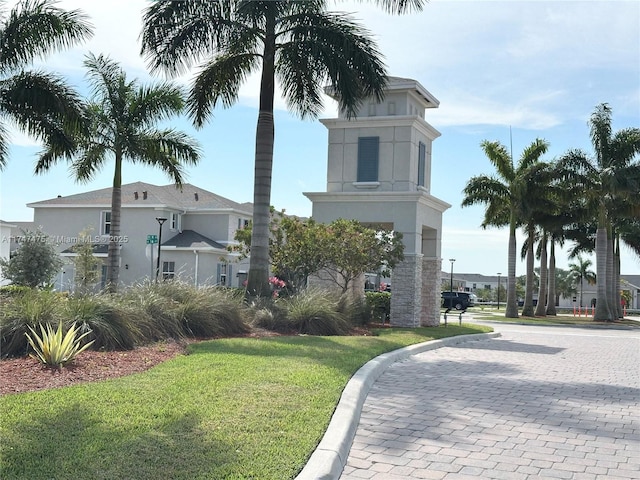 view of community featuring a yard