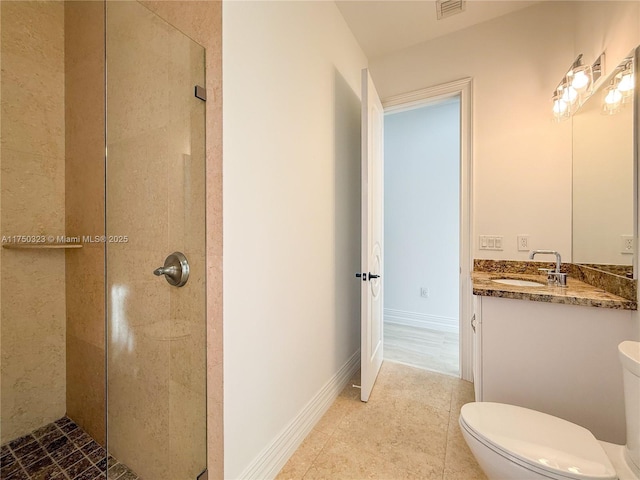 bathroom with visible vents, tiled shower, toilet, and baseboards