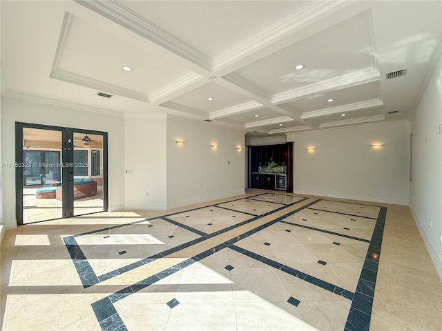 unfurnished living room with baseboards, french doors, crown molding, and recessed lighting