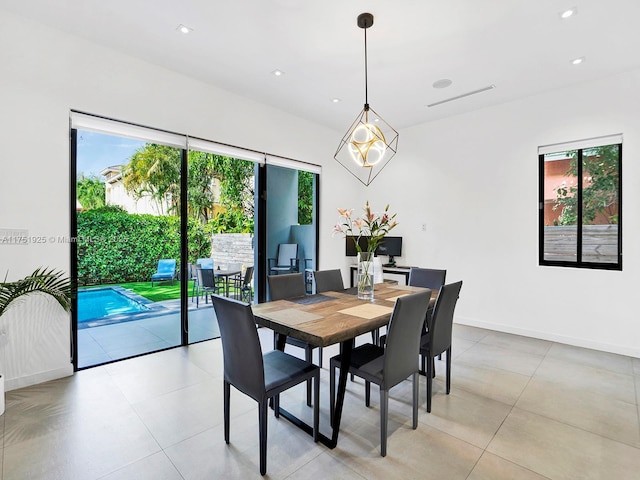 dining area with baseboards, recessed lighting, visible vents, and a healthy amount of sunlight