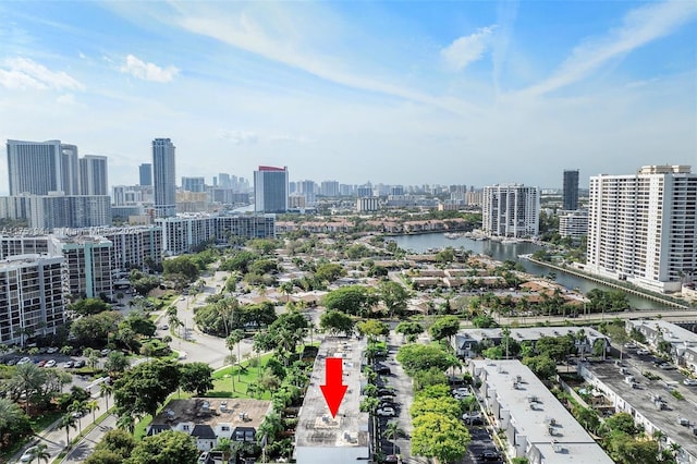 drone / aerial view with a view of city and a water view