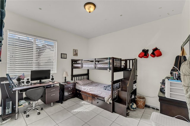 bedroom featuring light tile patterned floors