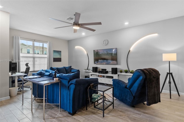 living room with wood tiled floor, visible vents, ceiling fan, and recessed lighting