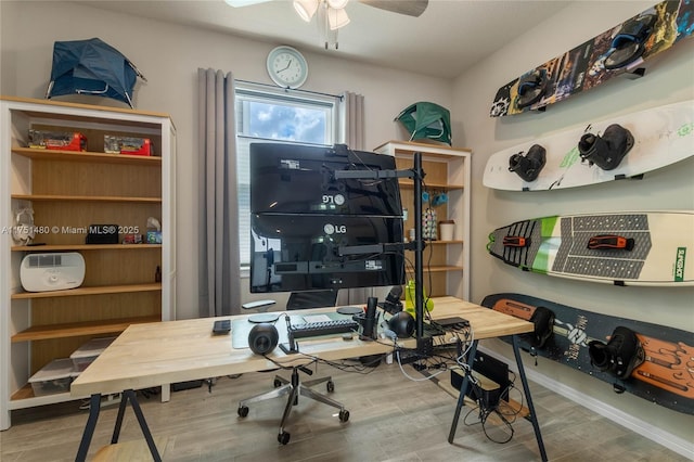 office featuring a ceiling fan and wood finished floors