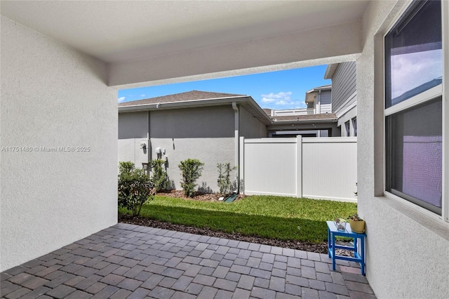 view of patio with fence