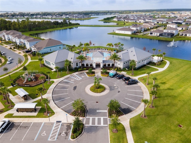 aerial view featuring a water view and a residential view