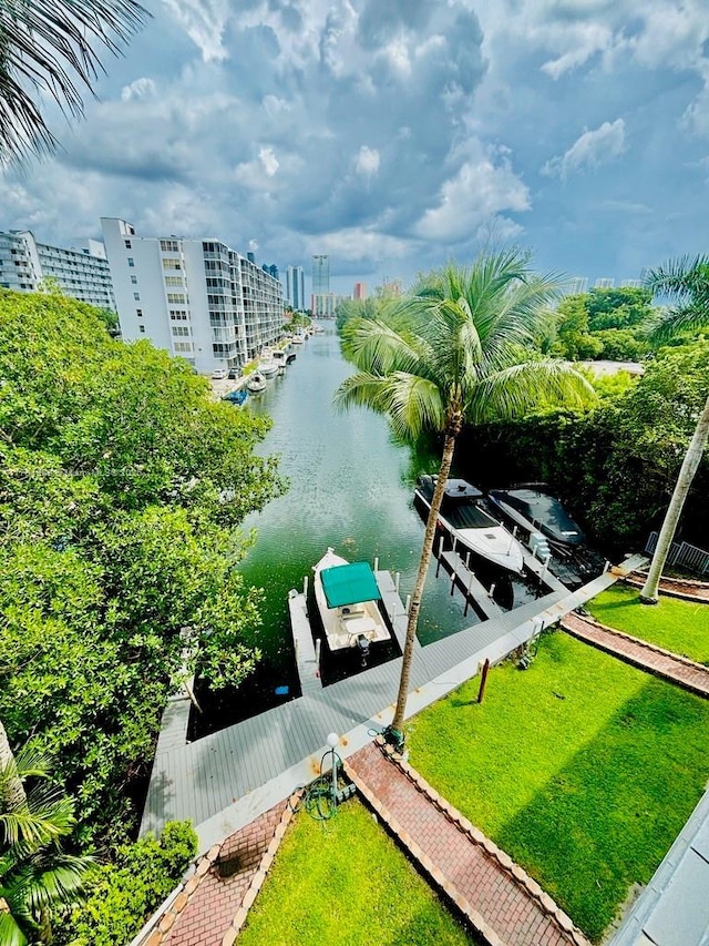 exterior space with a boat dock and boat lift