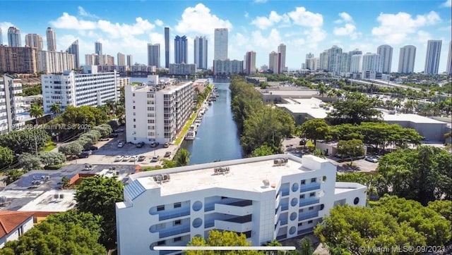 aerial view featuring a water view and a city view