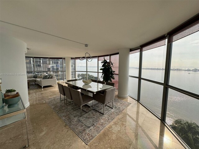 2025 Brickell Ave Unit 901, Miami, FL 33129 - sunroom featuring a water view