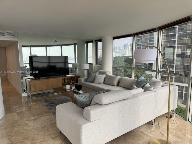 2025 Brickell Ave Unit 901, Miami, FL 33129 - living room featuring plenty of natural light and marble finish floors