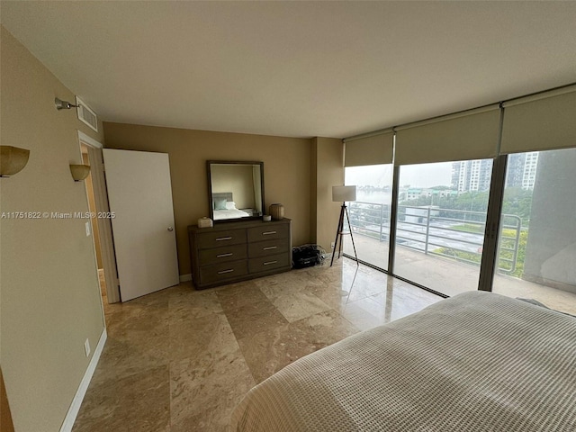 2025 Brickell Ave Unit 901, Miami, FL 33129 - bedroom featuring access to outside, baseboards, and floor to ceiling windows