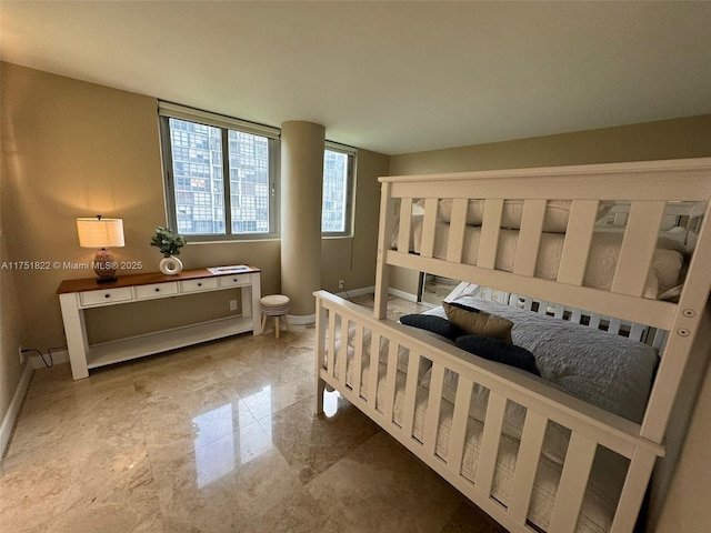 2025 Brickell Ave Unit 901, Miami, FL 33129 - bedroom with marble finish flooring and baseboards