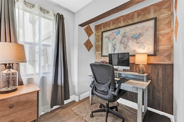 home office featuring baseboards and wood finished floors