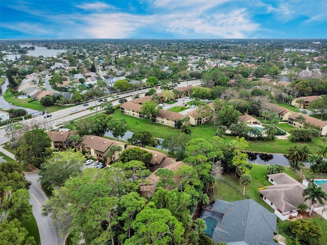 aerial view with a water view and a residential view
