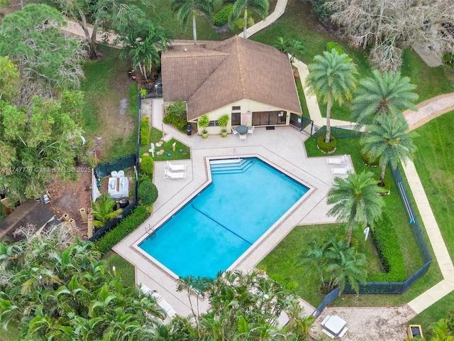 pool featuring a patio area and a fenced backyard