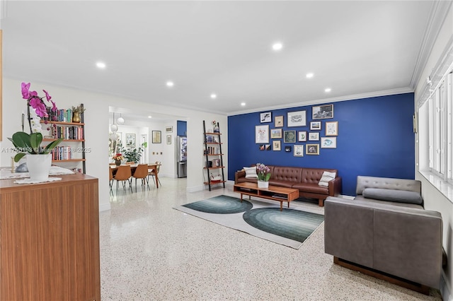 living area with crown molding, recessed lighting, speckled floor, and baseboards